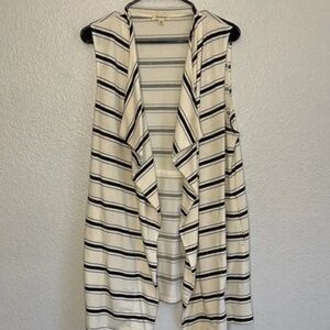 Crème and Black Vest